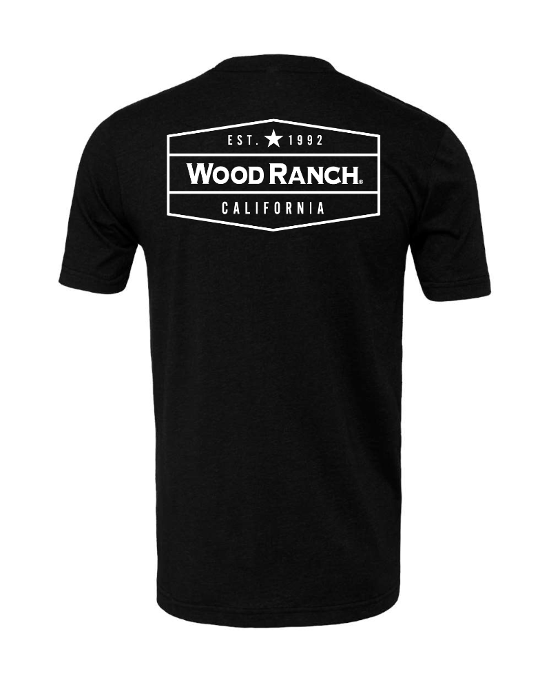 About the product. Backside of black jersey style garment. White Wood Ranch emblem logo in the center.