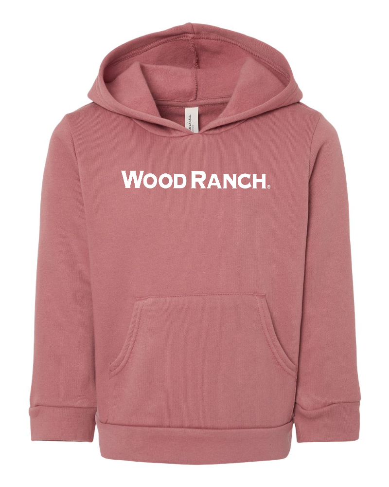 About the product. Frontside of mauve pink pullover hoodie style garment for toddlers. White Wood Ranch logo in the center. 